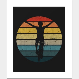 Bicyclist Silhouette On A Distressed Retro Sunset design Posters and Art